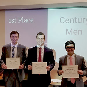 Three students at Century Men award ceremony