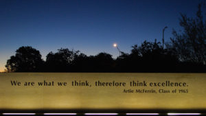Sign on campus that reads "We are what we think, therefore think excellence." - Artie McFerrin, Class of 1963