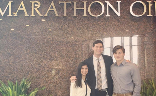 Gabrielle Joubran standing in front of Marathon Oil with others.