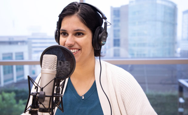 Ritika Bhattacharjee making a podcast.