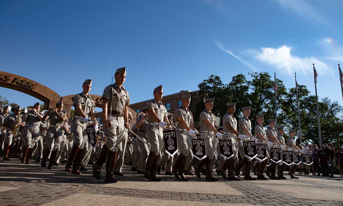 The Fightin' Texas Aggie Band marching on Texas A&M University campus
