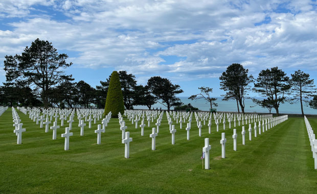 Scenic view of crosses in the ground at Normandy American Cemetery