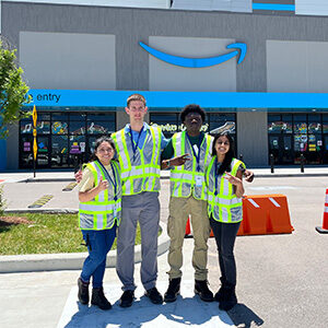 Austin Kees with other interns in front of an Amazon building