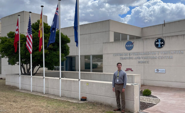 Austin Kees in front of the NASA Visitors Center in Madrid, Spain