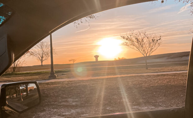 Sunset view through a car window